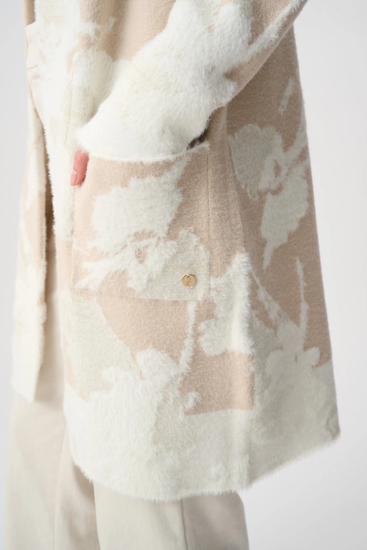 Close-up of fabric texture and trim on Joseph Ribkoff Floral-Print Open-Front Long Cardigan in Oatmeal/Winter White, style 253956F26