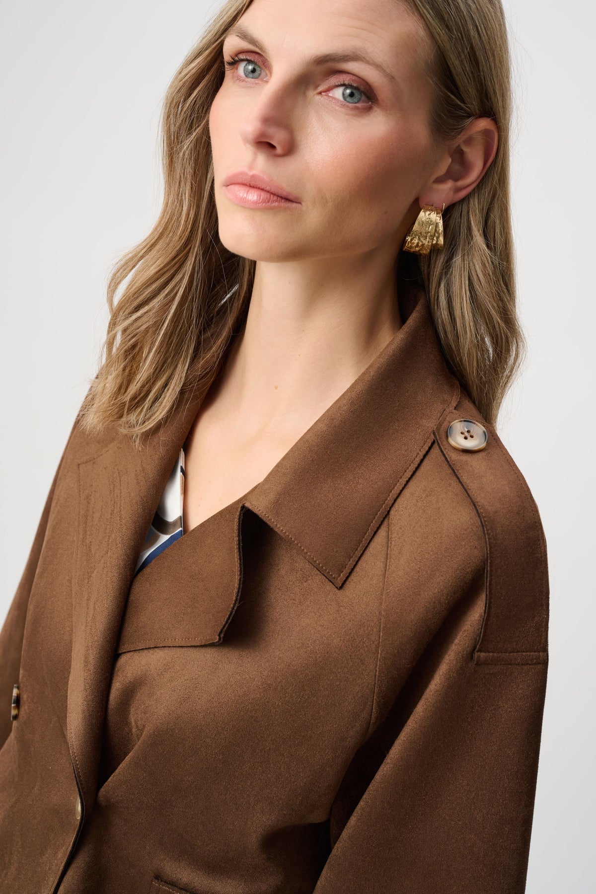 Close-up of collar and fastening details on Joseph Ribkoff Faux Suede Cropped Jacket in Brown, style 263000