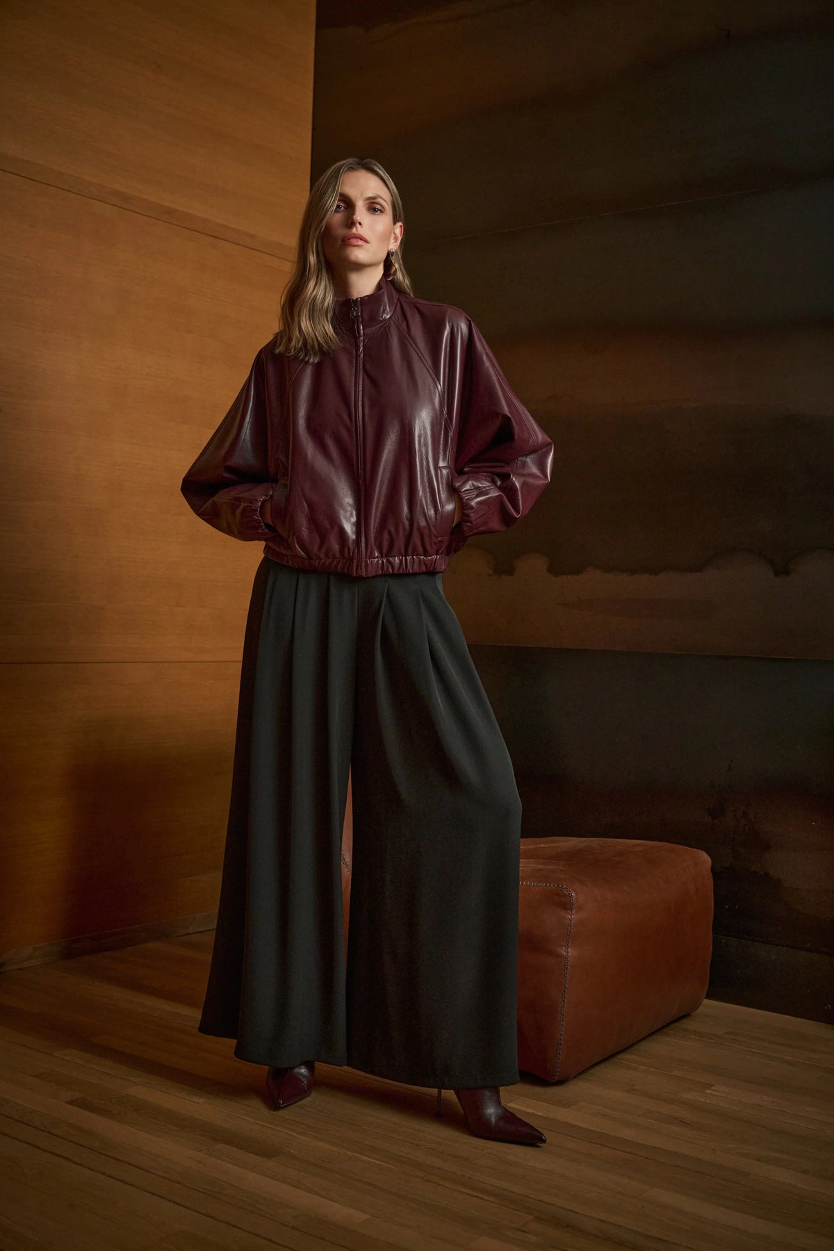 Full styled view featuring Joseph Ribkoff Pleated Wide-Leg Pants in Black, style 263040