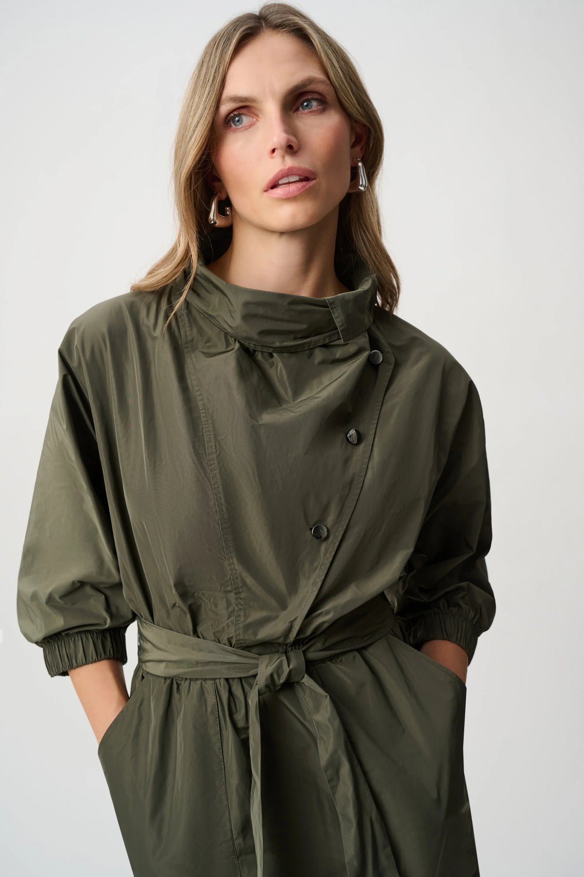 Close-up of neckline and bodice details on Joseph Ribkoff Cowl-Neck Belted Dress in Avocado, style 263182