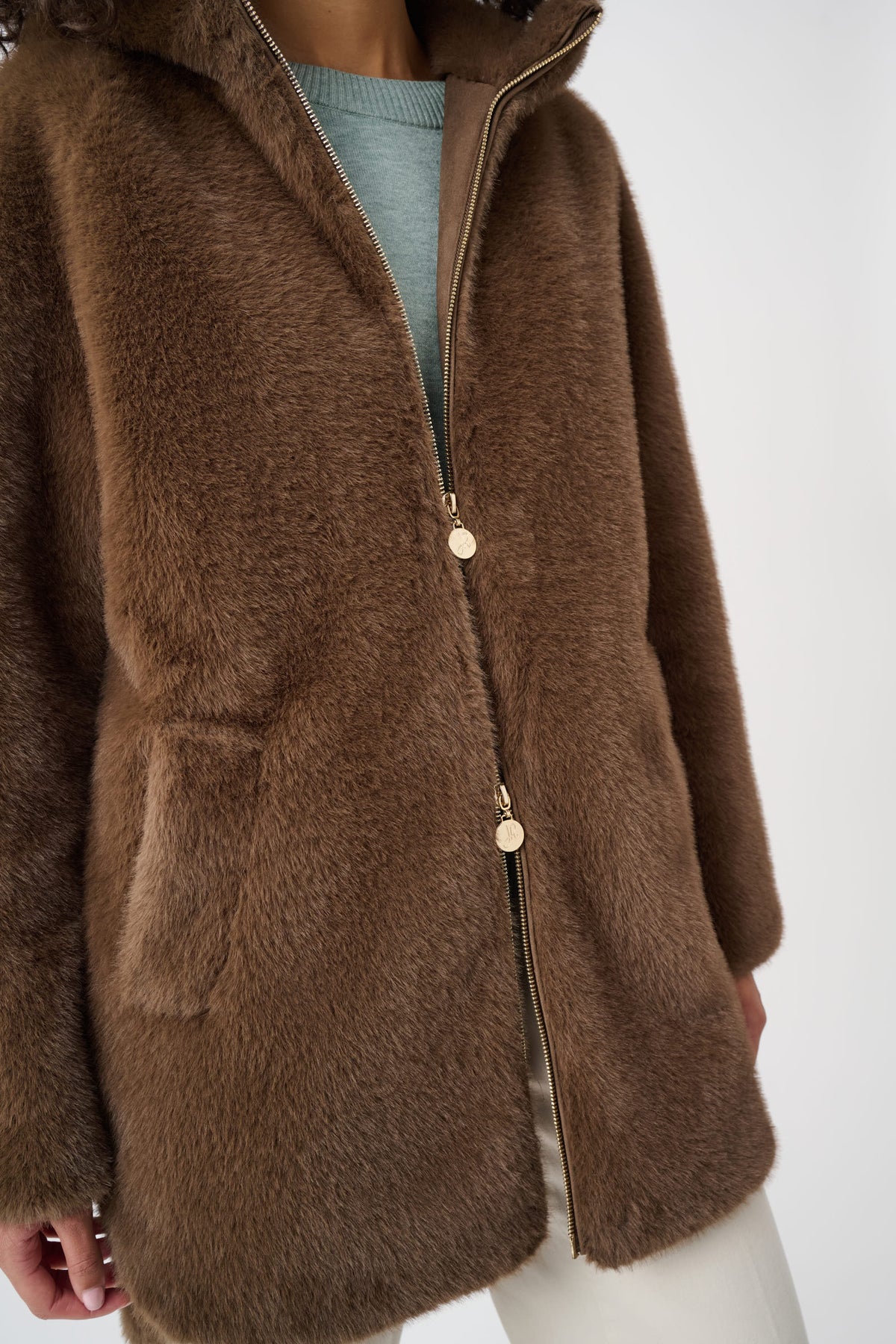 Close-up of fabric texture and trim on Joseph Ribkoff Faux Fur Hooded Coat in Dark Mink, style 263914