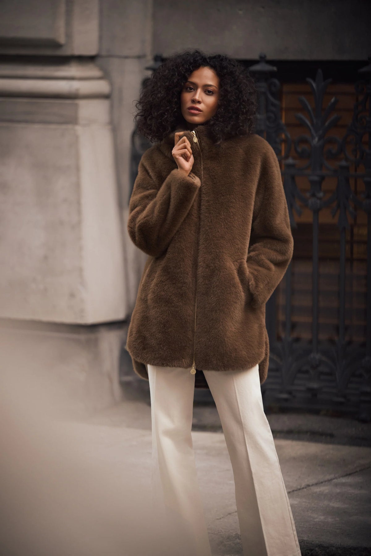 Full-length styled outfit featuring Joseph Ribkoff Faux Fur Hooded Coat in Dark Mink, style 263914