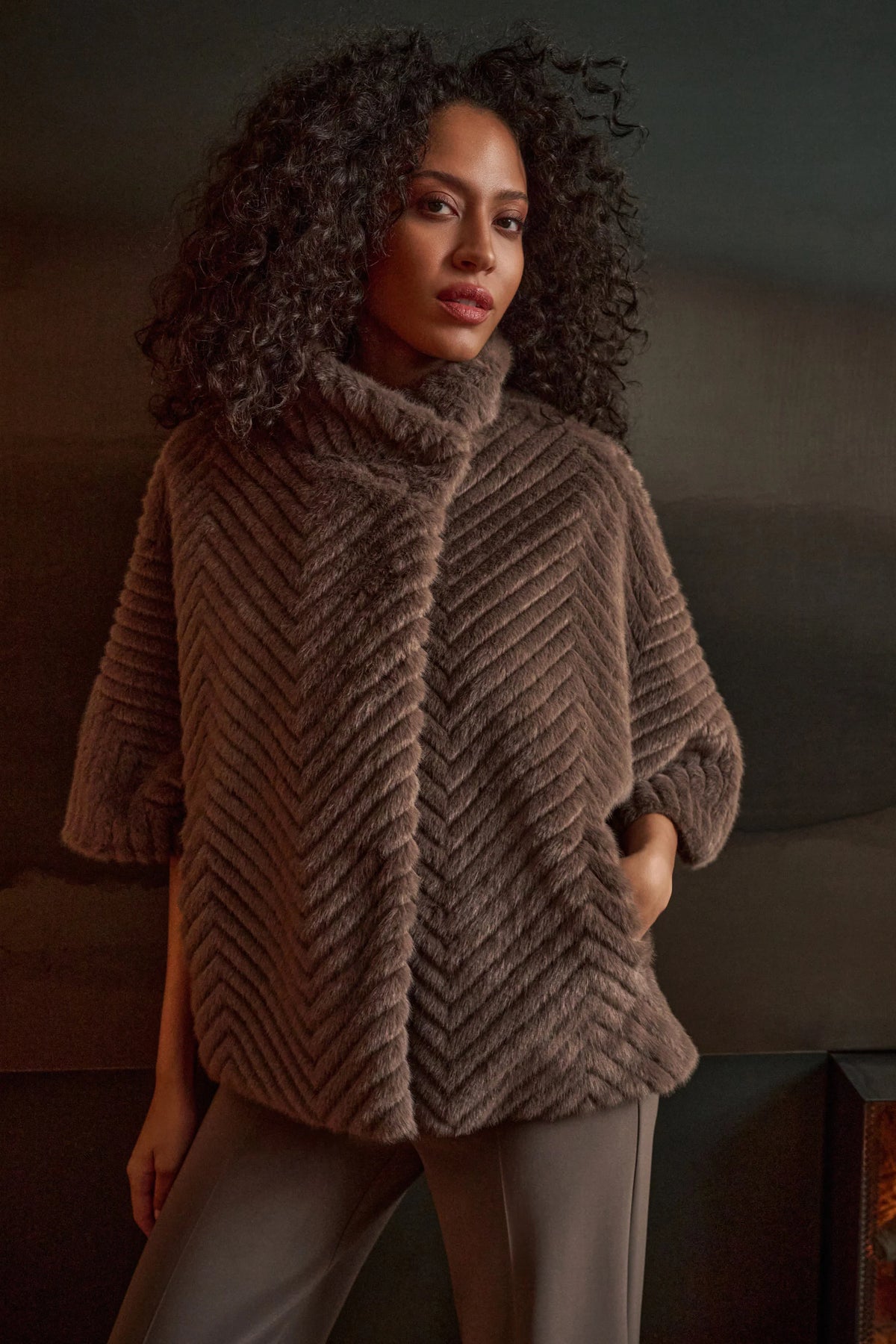 Close-up of fabric, sleeve, trim or fastening on Joseph Ribkoff Chevron Faux-Fur Cape-Style Jacket in Mink, style 263917