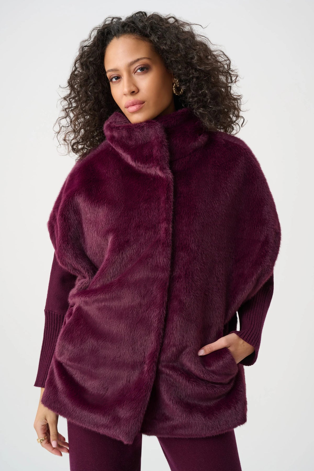 Joseph Ribkoff Faux Fur Funnel Neck Boxy Vest in Elderberry, style 263918 shown from the front