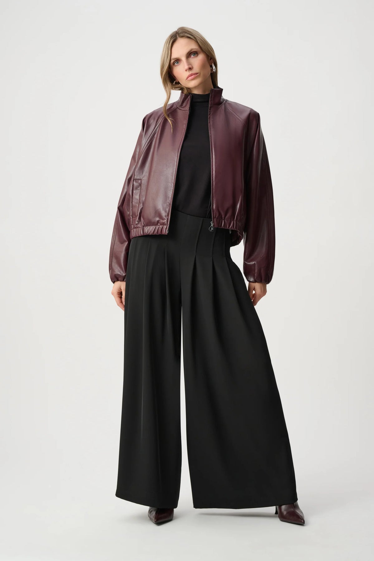 Full styled view featuring Joseph Ribkoff Leatherette Mock-Neck Bomber Jacket in Burgundy, style 263971