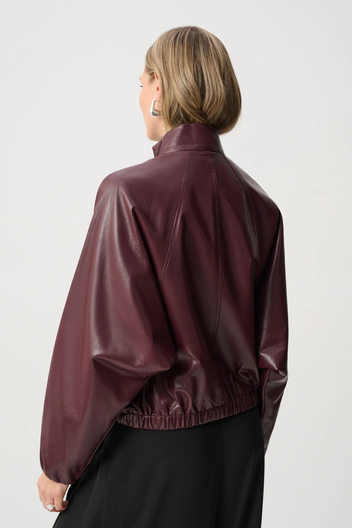 Joseph Ribkoff Leatherette Mock-Neck Bomber Jacket in Burgundy, style 263971 shown from the back