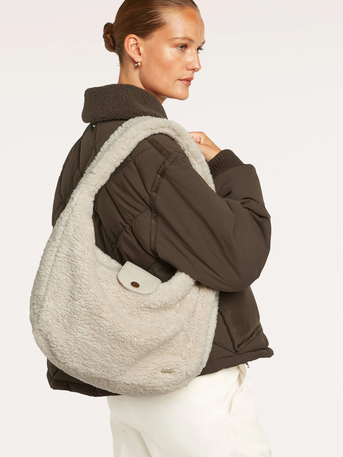 Beaumont Amada faux lammy bag in Off White