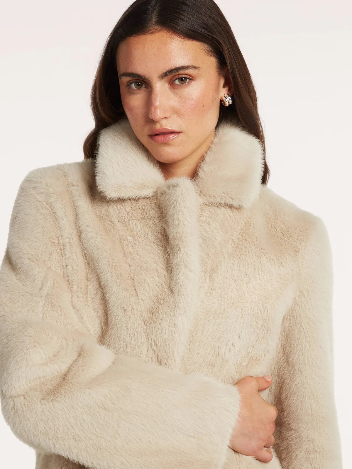 Close-up of concealed snap fastening on Beaumont Coby Coat champagne