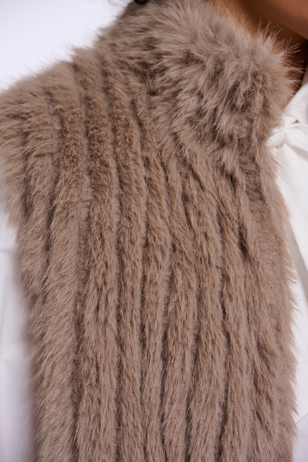 Close-up of Rino & Pelle Dava Waistcoat faux fur texture in Mocha Latte
