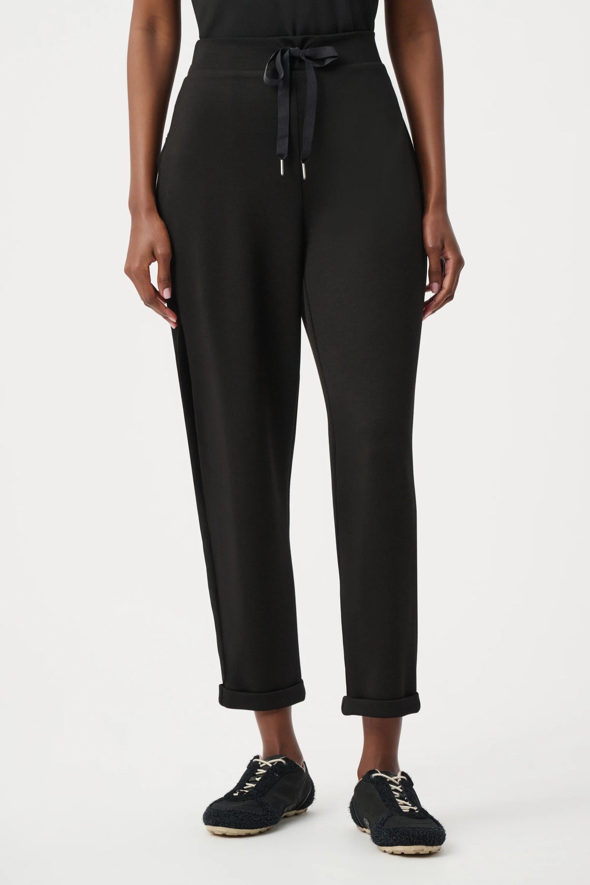 Joseph Ribkoff Pull-On Drawstring Waist Jogger Pants in Black, style 261606F26 shown at a three-quarter angle