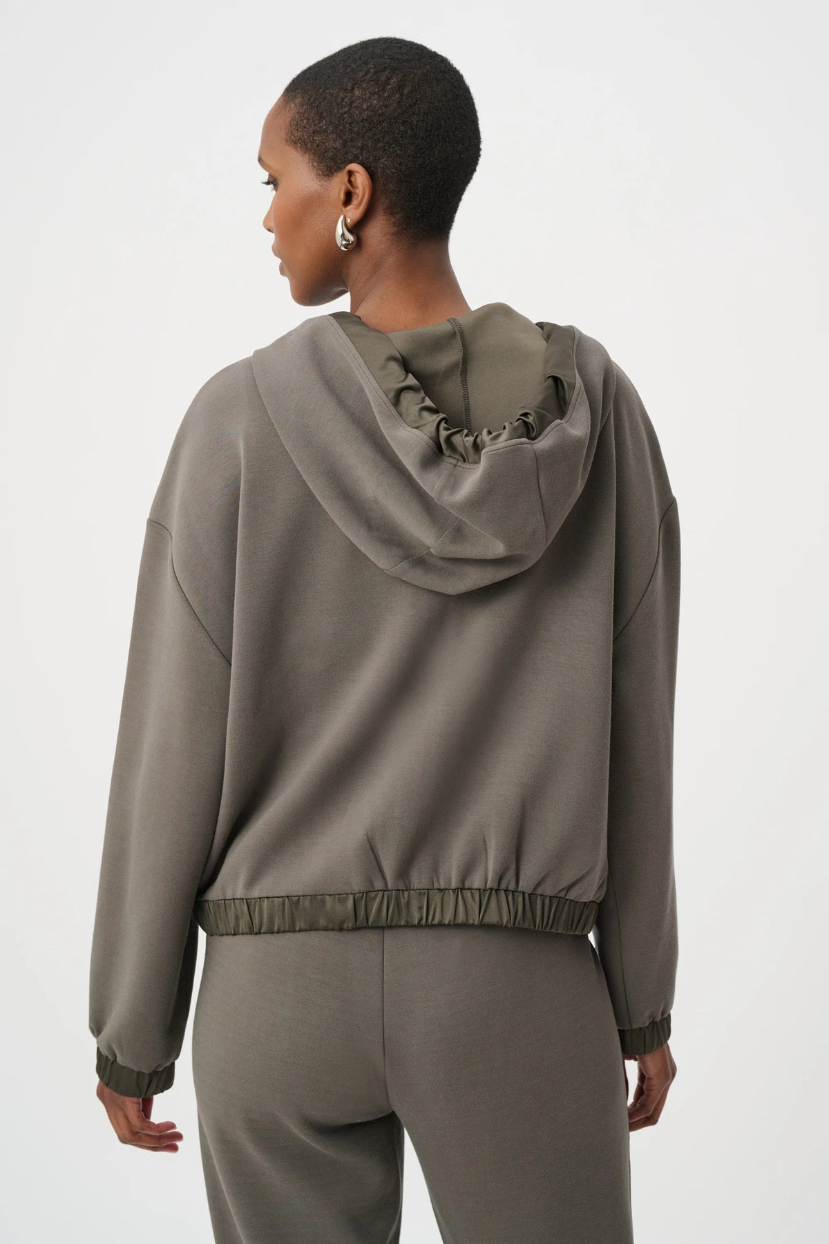 Joseph Ribkoff Scuba Jersey & Satin Hooded Boxy Jacket in Avocado, style 263624 shown from the back
