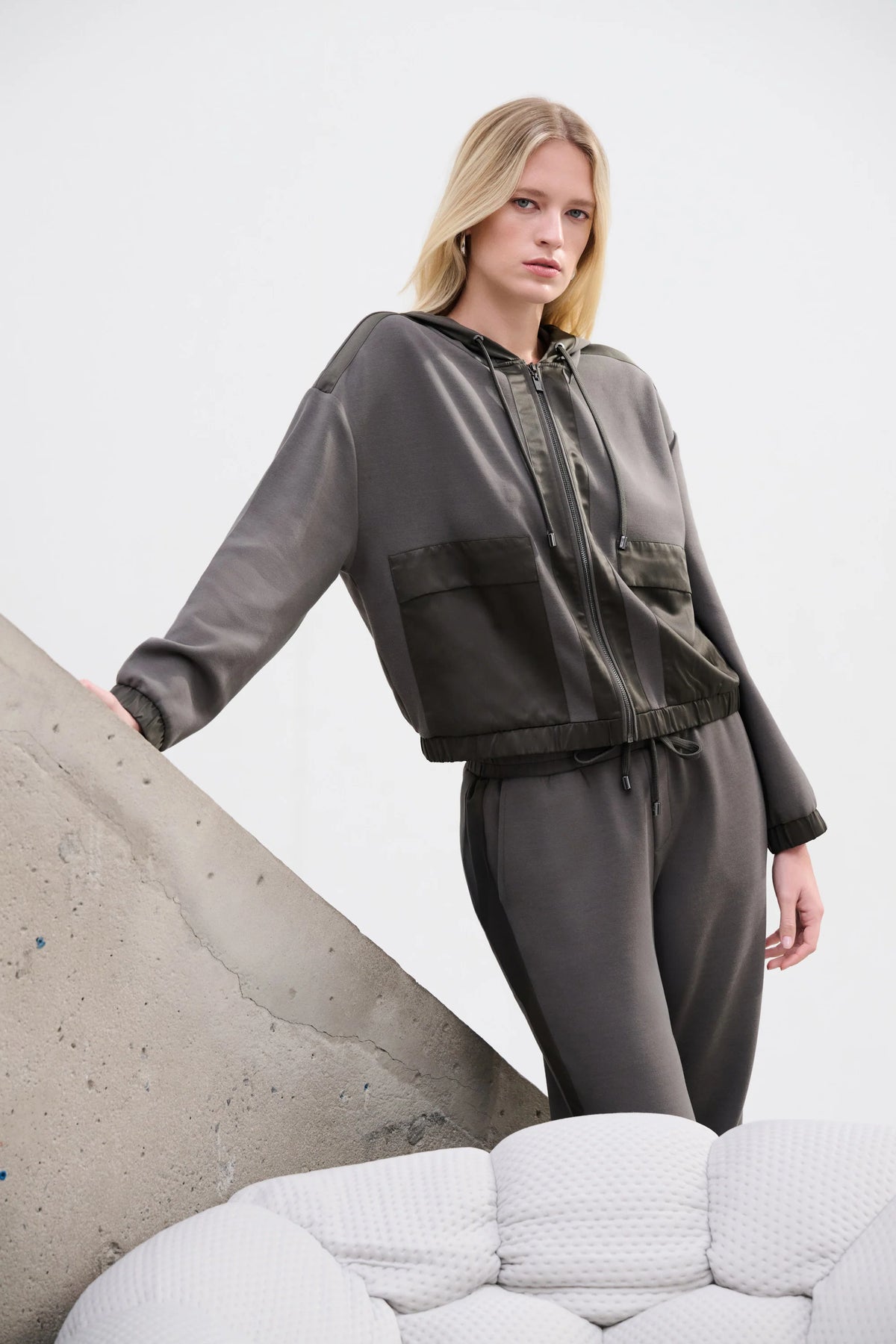 Full styled view featuring Joseph Ribkoff Scuba Jersey & Satin Hooded Boxy Jacket in Avocado, style 263624 in setting 