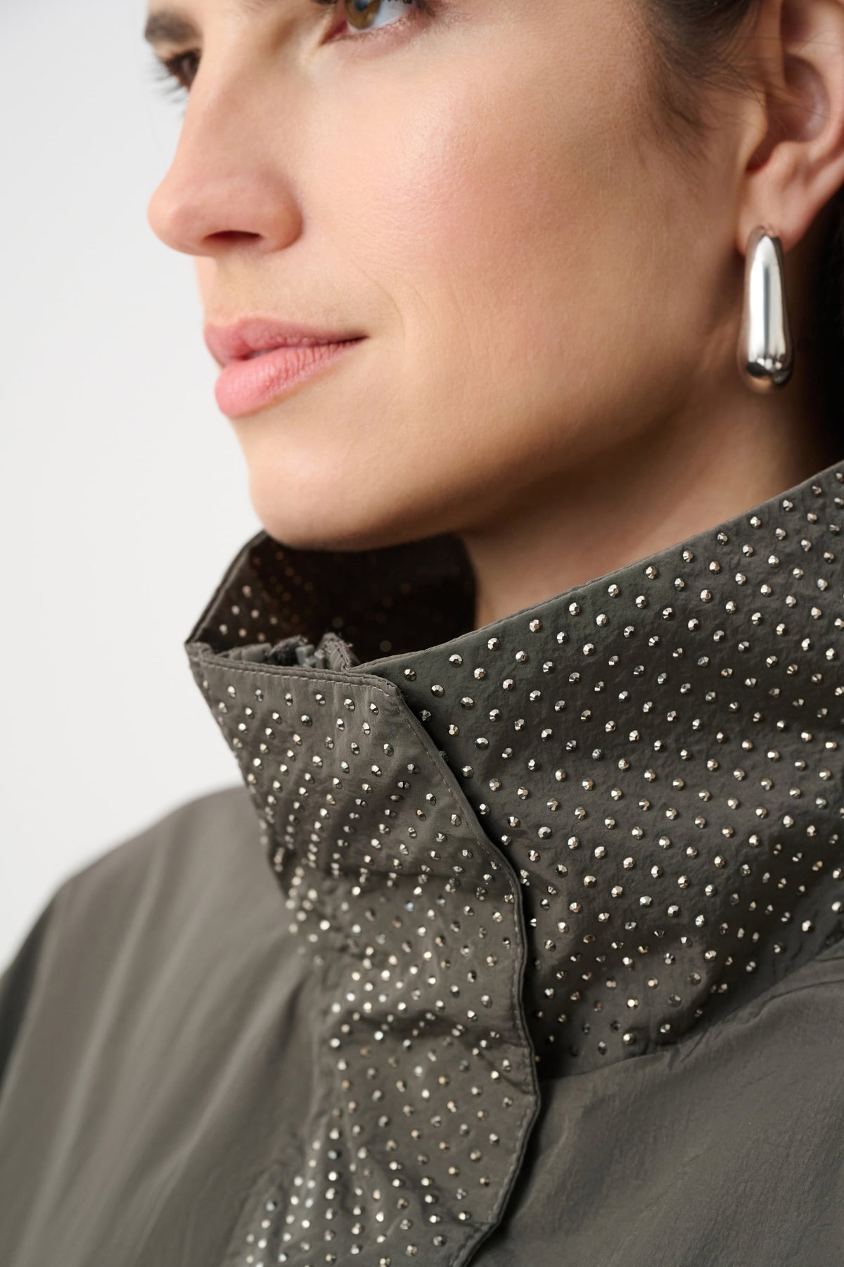 Close-up of neckline and upper-body details on Joseph Ribkoff Embellished Utility Jacket in Avocado, style 263633