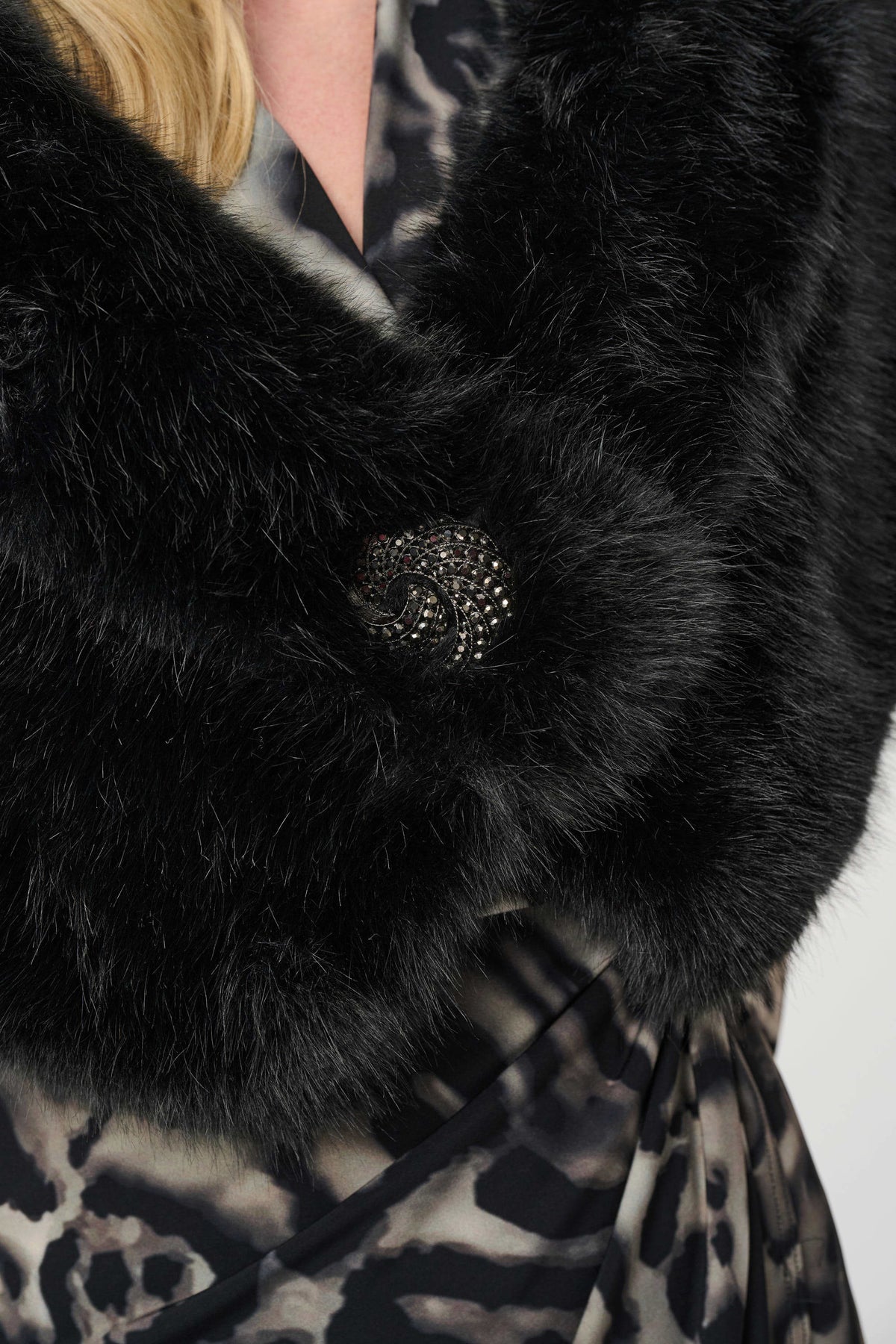 Close-up of fabric, sleeve, trim or fastening on Joseph Ribkoff Luxury Faux Fur Wrap in Black, style 263740