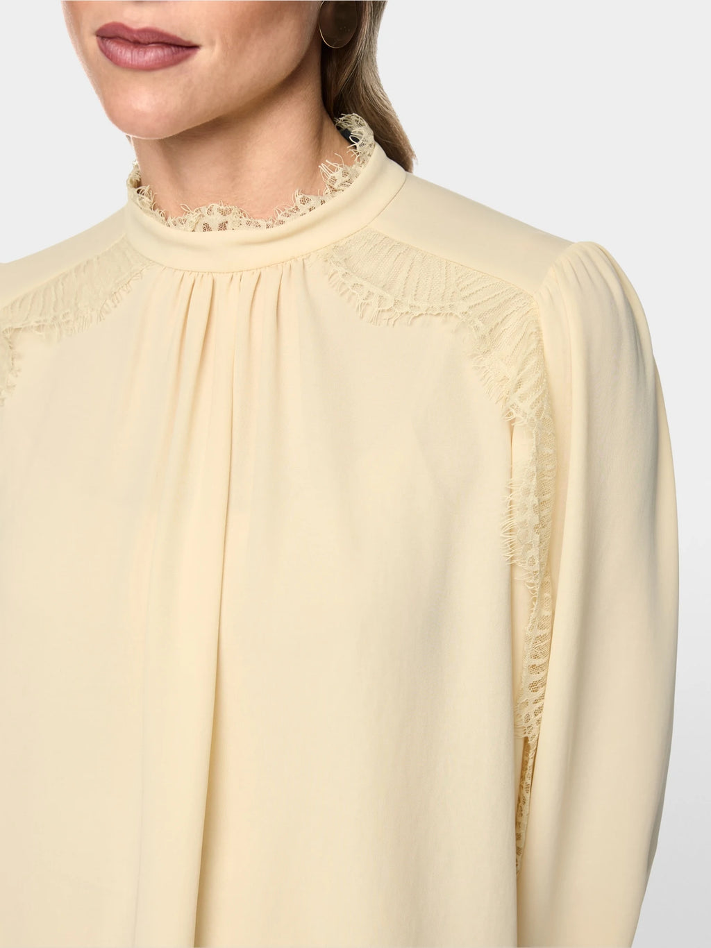 Marc Cain blouse showing stand-up collar