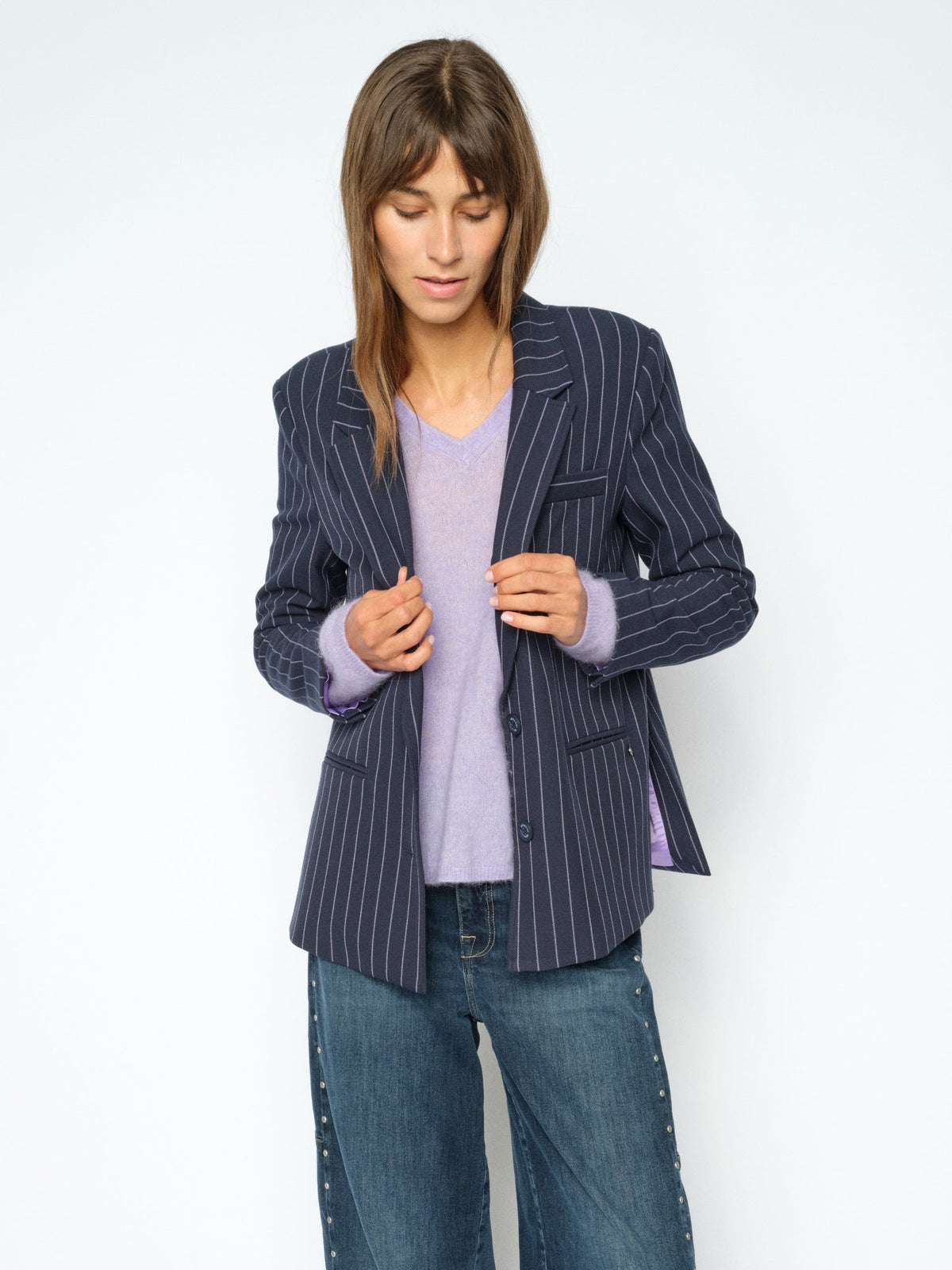 Soft mohair texture of Mos Mosh Violet Tulip knit with a striped blazer
