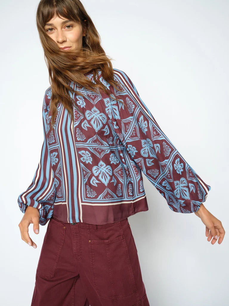 Mos Mosh model wearing Linocut blouse in Port Royale. Posing 