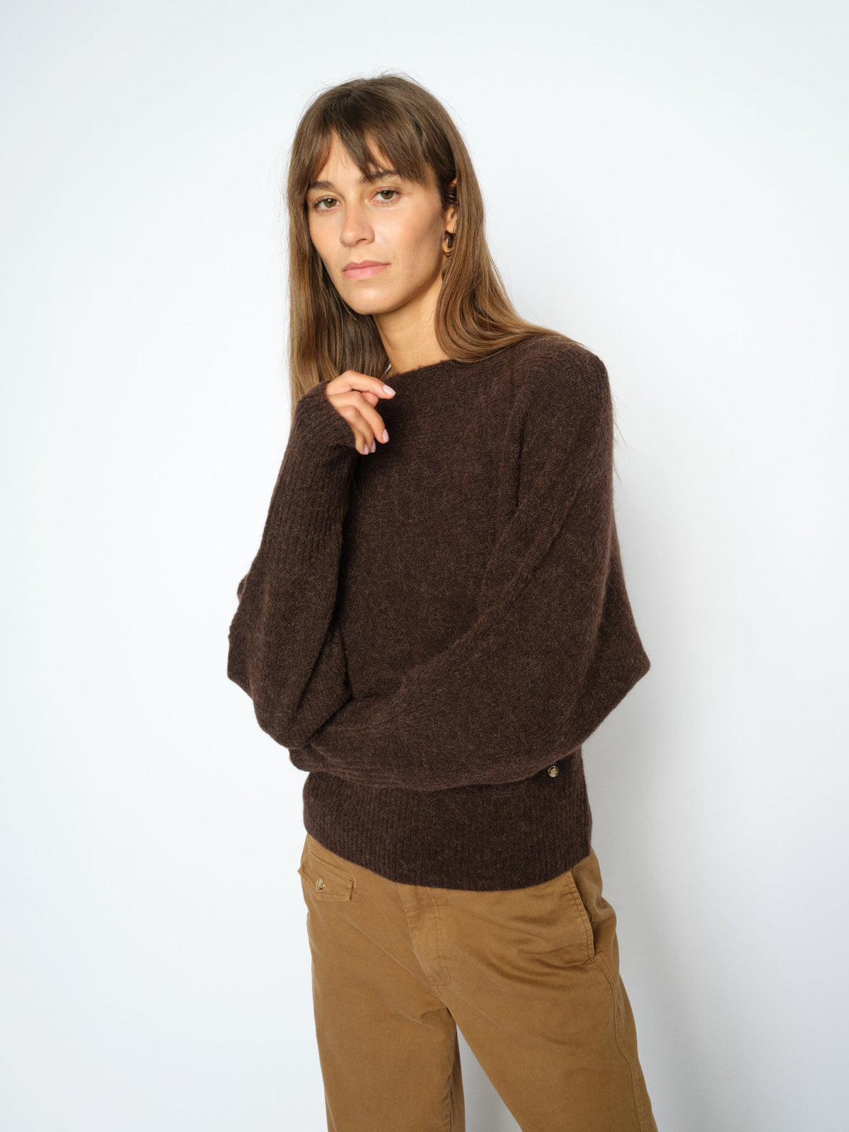 Model wearing Mos Mosh Thora boatneck knit in Delicioso brown