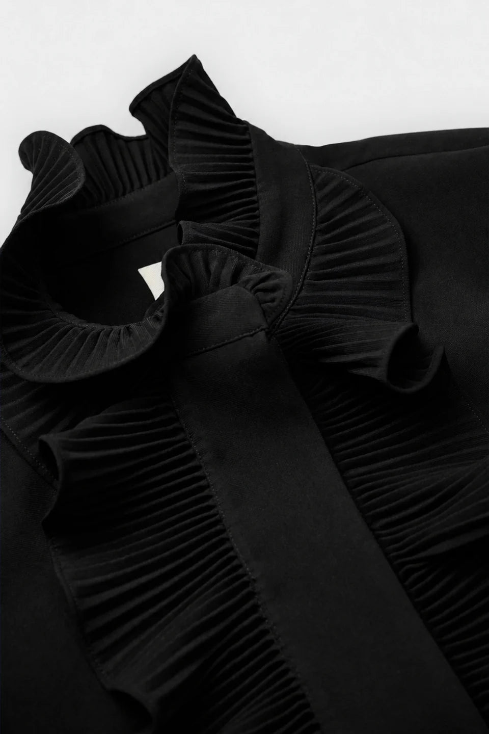 Psophía Black dress showing mandarin collar