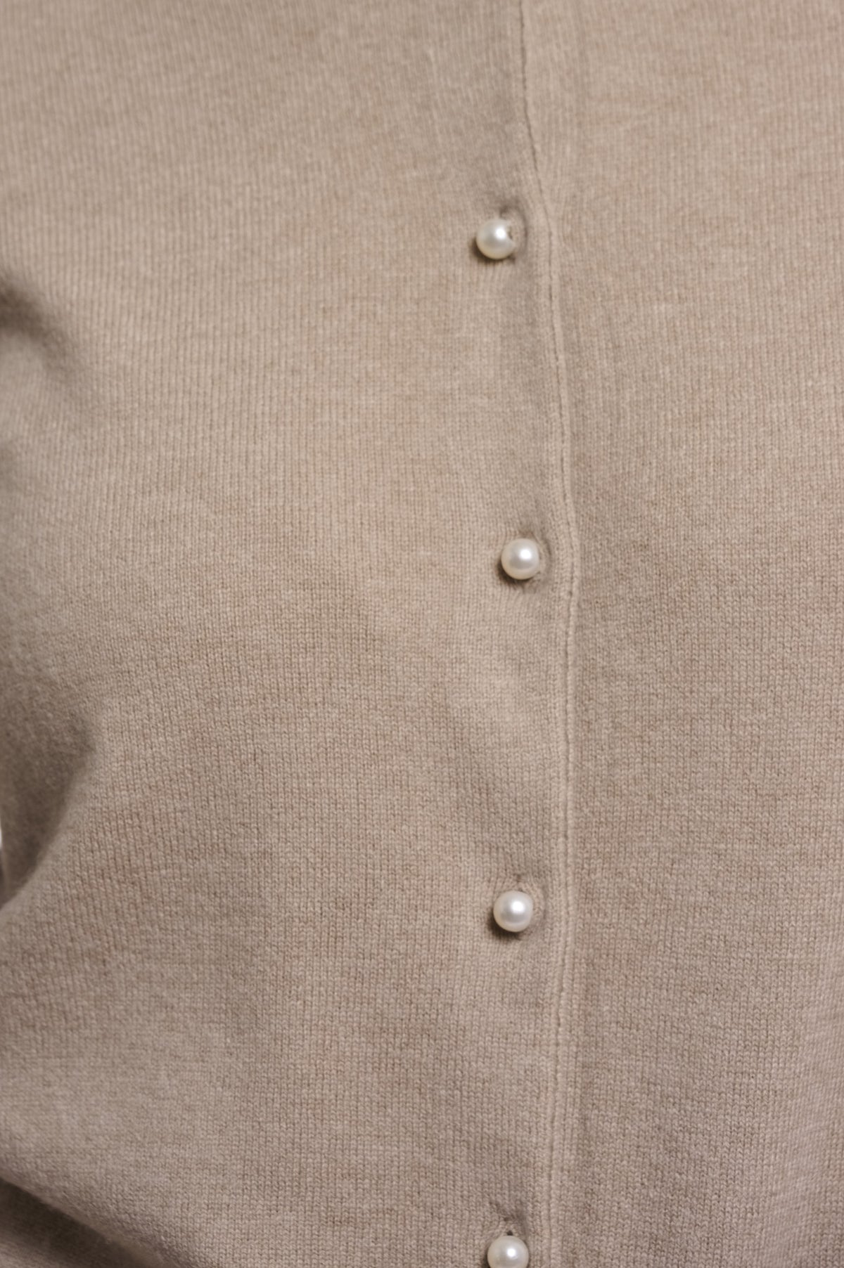 Close-up of merino wool knit on Rino & Pelle Jager Cardigan sand