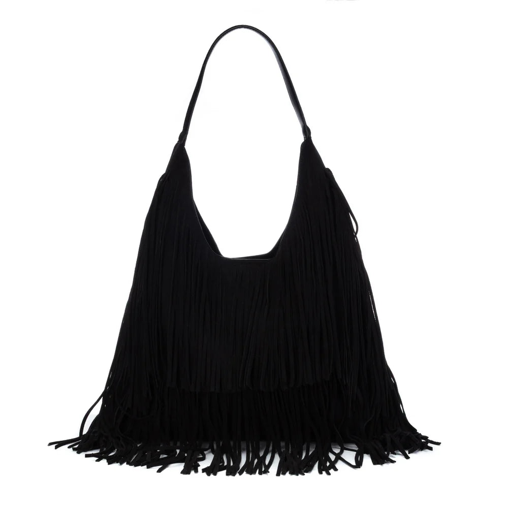 A black suede fringe shoulder bag with a single strap, photographed against a solid white background. XTI 184708 BLACK